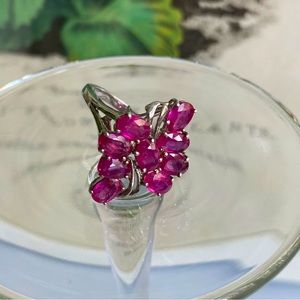925 silver ring with pink magenta coloured stones